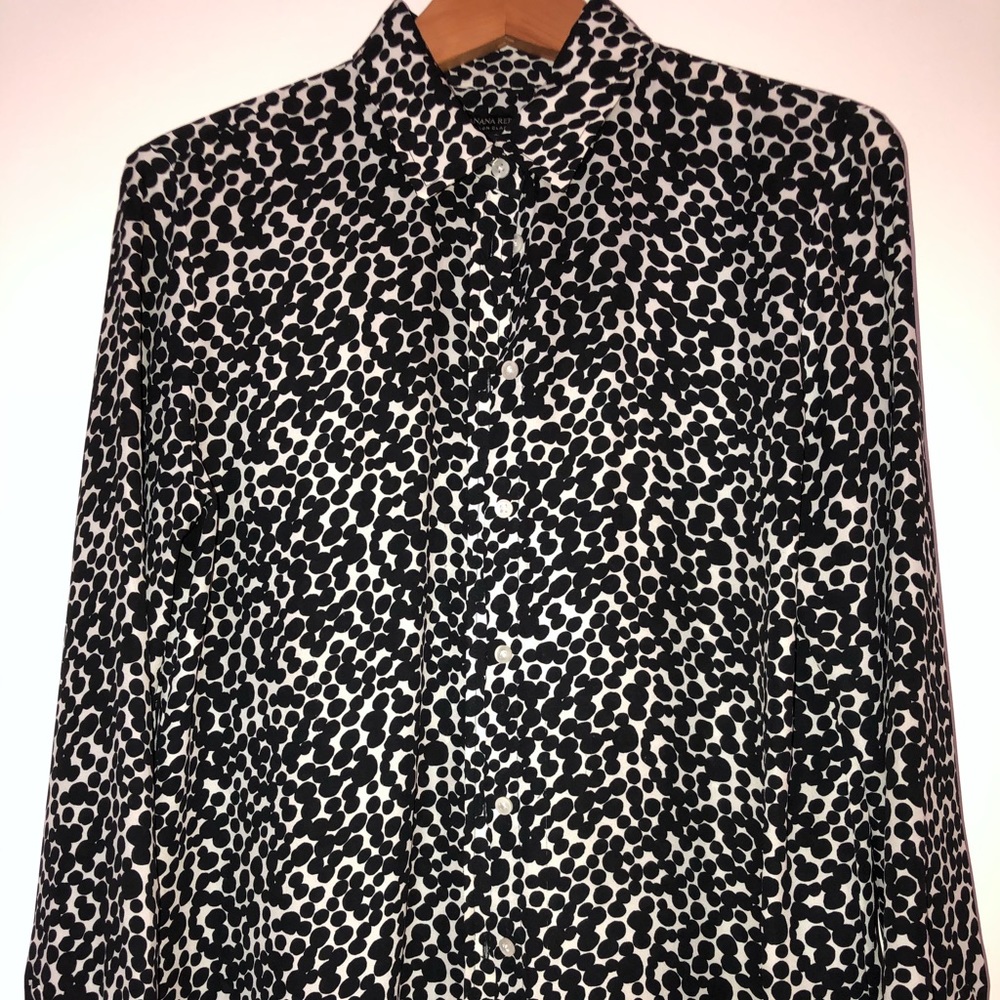 Black and white top or blouse.